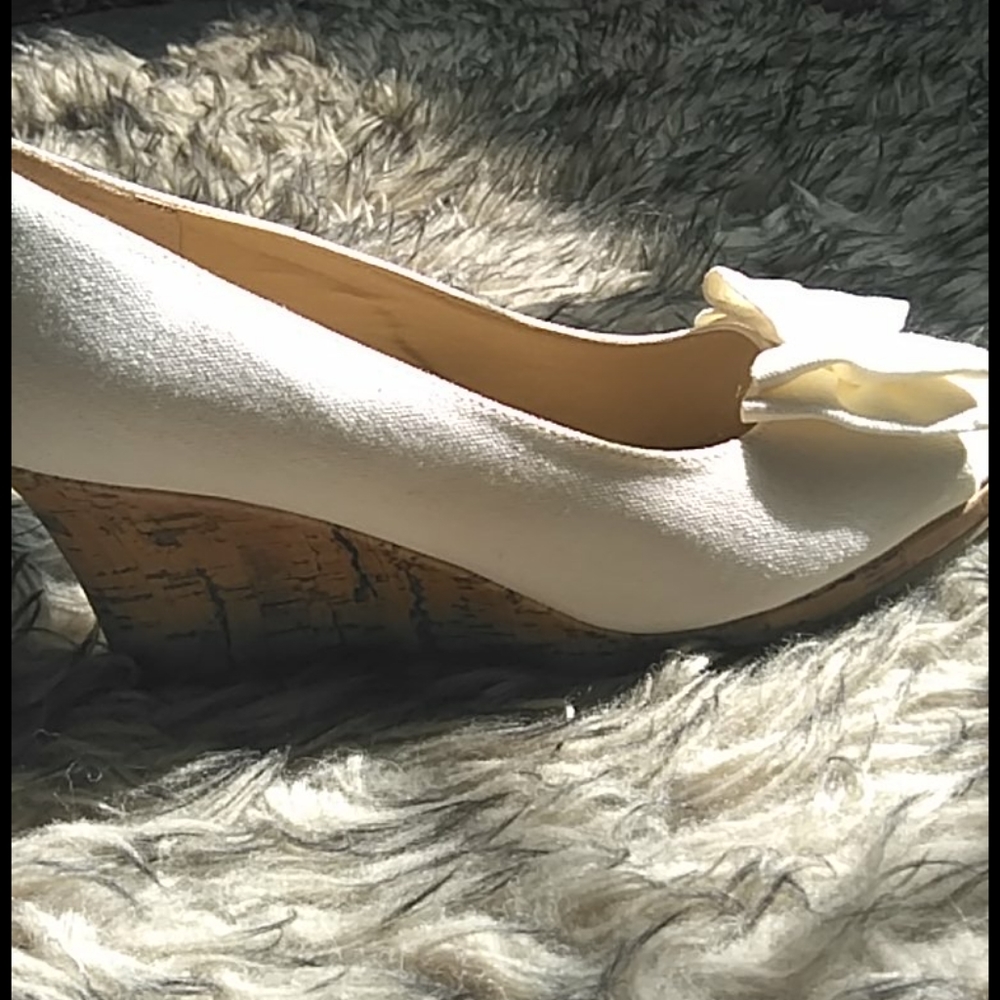 Cream open toe wedge with bows
